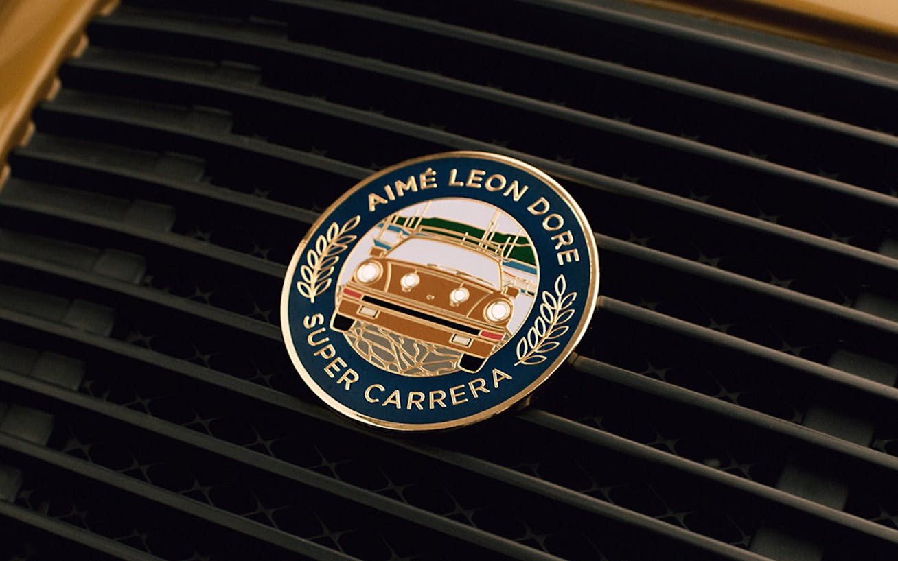 Porsche x Aimé Leon Dore grille badge