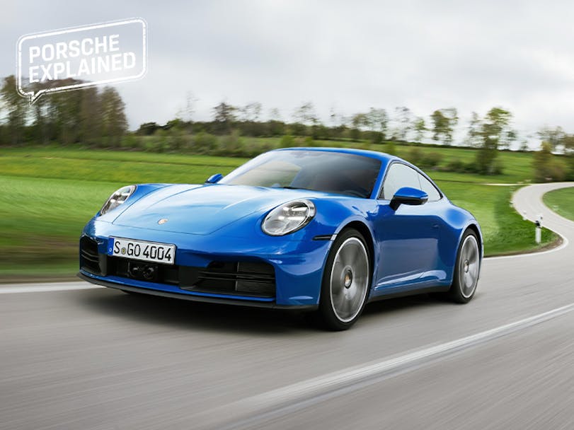 Porsche 911 Carrera in Lugano Blue on twisting German road