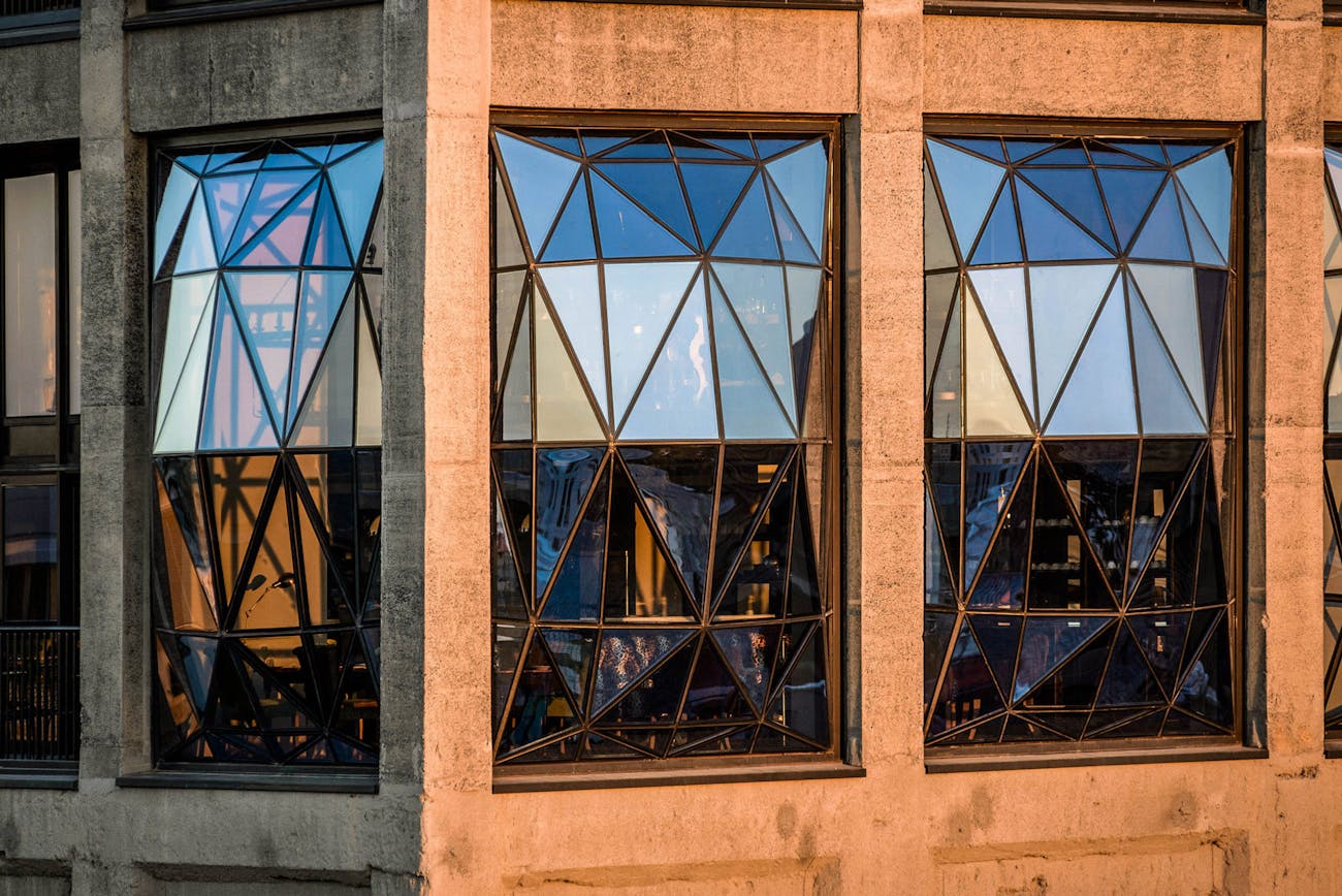 Close up of window facade with outwardly curved glass