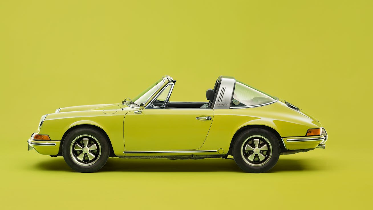 Side view of a classic Porsche 911 Targa in a studio