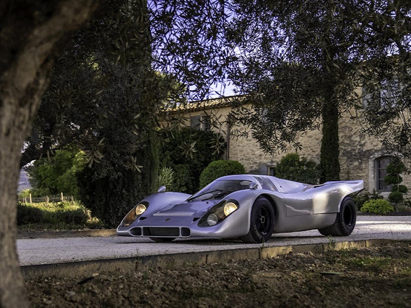 Porsche 917 KH Street parked outside country house