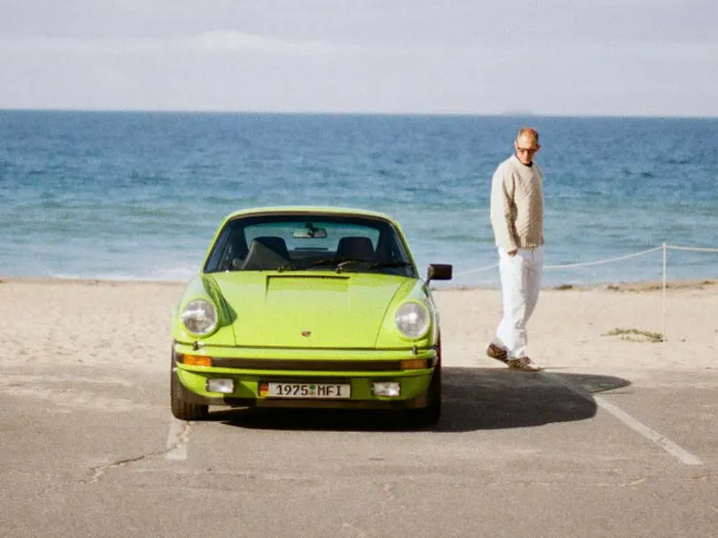 Birch Green Porsche 911 Carrera at the beach thumbnil