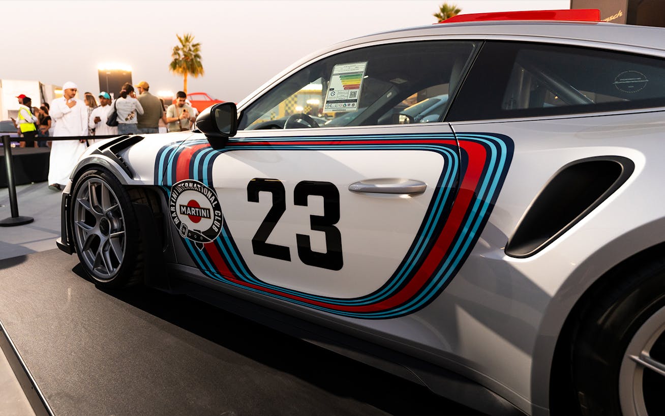Martini-inspired silver Porsche 911 GT3 RS at the 2025 Icons of Porsche in Dubai 