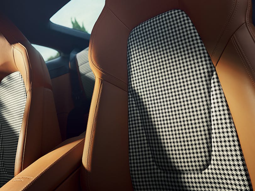 Close-up of Porsche Pepita fabric on car seat