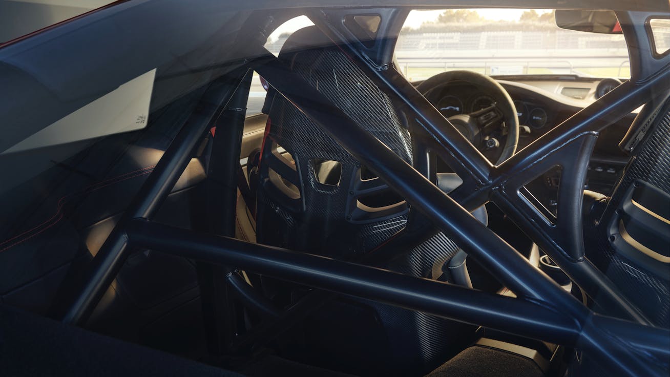 View of interior showing carbon fibre seats and rear struts
