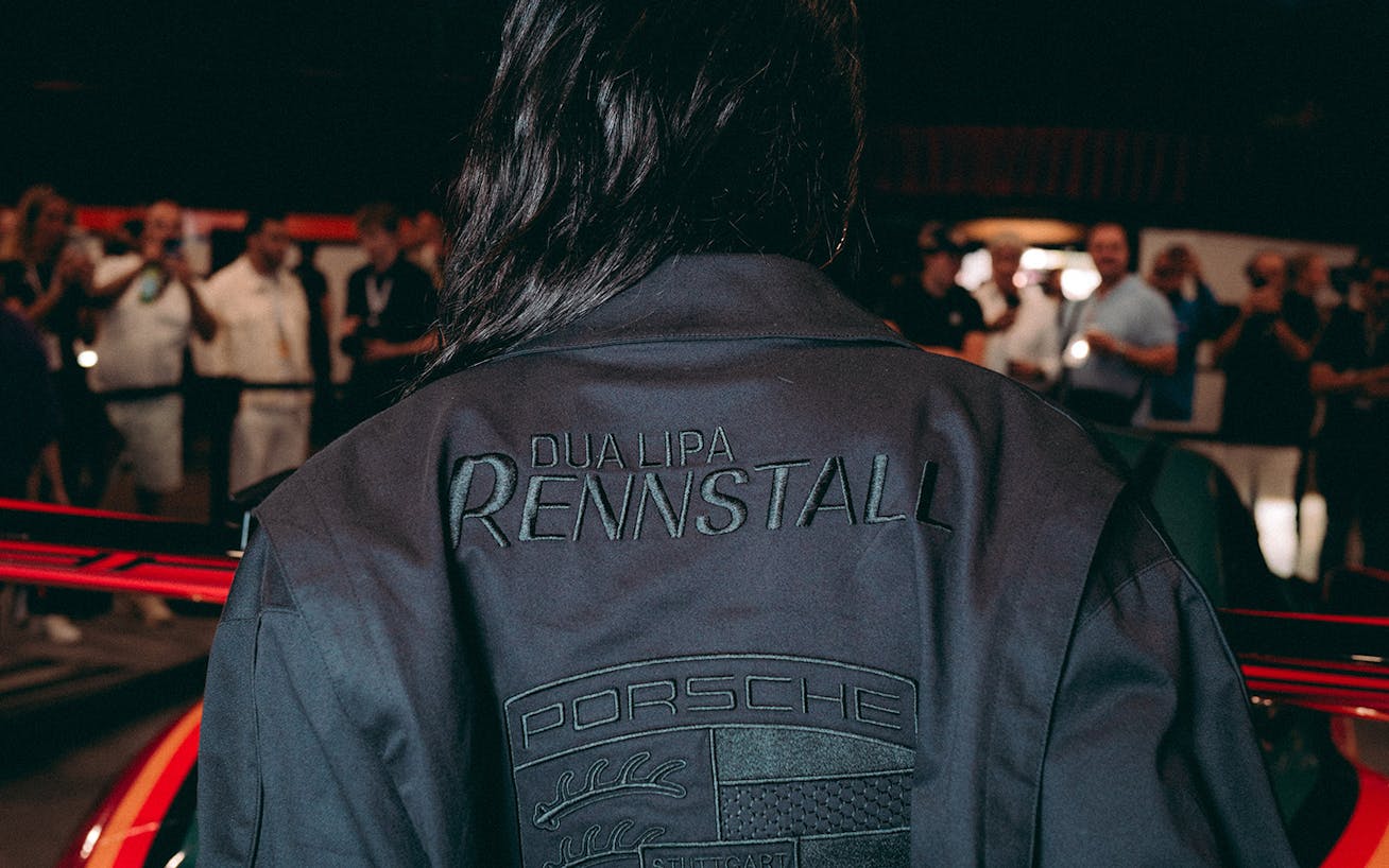 Dua Lipa in Porsche jacket with Dua Lipa Rennstall GT3 RS