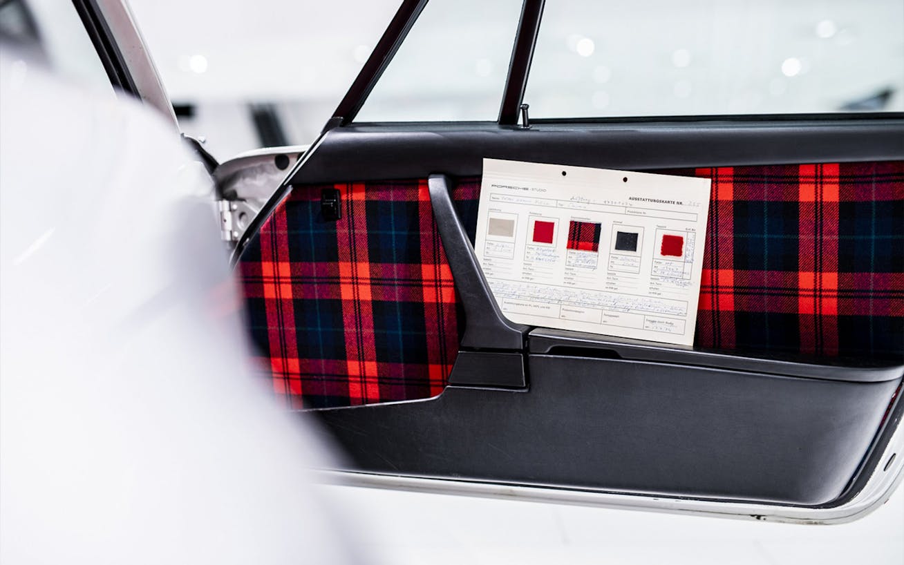 Car door interior covered in McLaughlin tartan fabric 