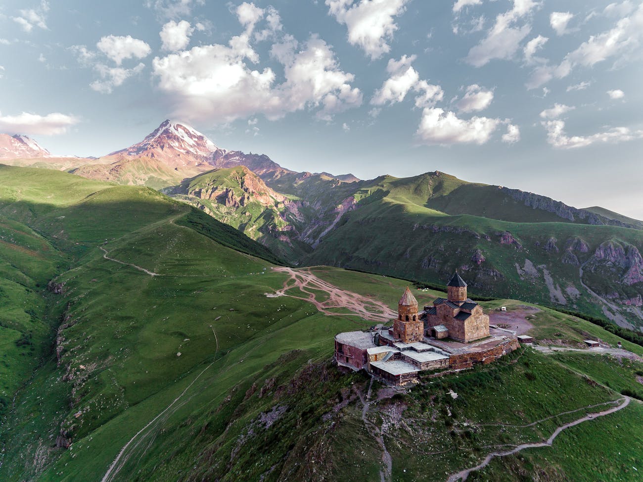 A remote hilltop monastery surrounded by gorges and mountains