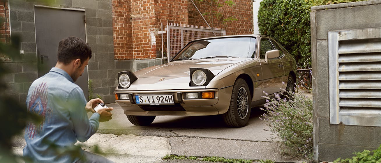 Classic Porsche 924 in Light Bronze Metallic, pop-up headlights open