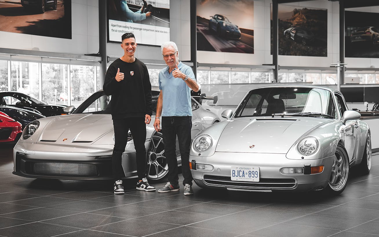 Karl Conrad and his father at Porsche dealership in Toronto