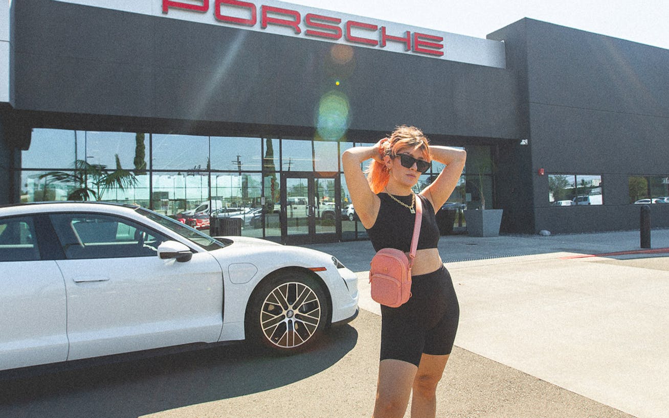 Influencer Grace Mattei with Porche Taycan in LA