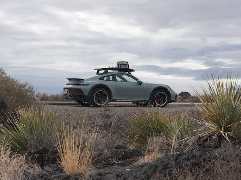 Porsche 911 Dakar in grey on desert road