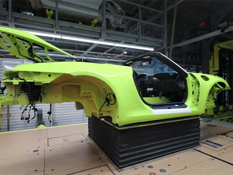 Picture of the shell of a Porsche 911 Cabriolet on the production line in the Porsche factory