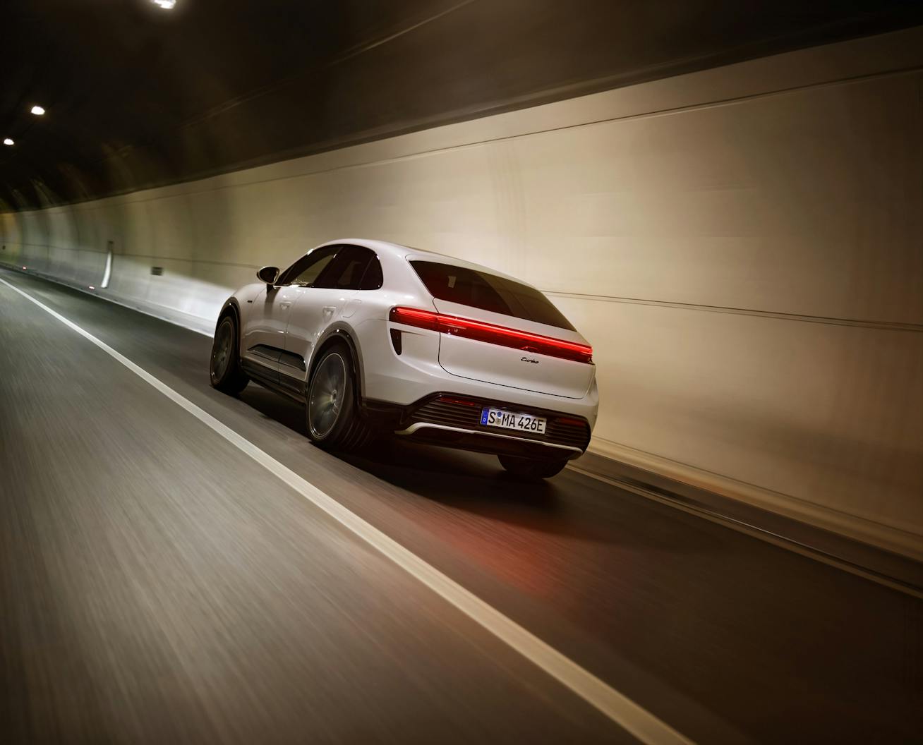 Porsche Macan Turbo driving in a tunnel