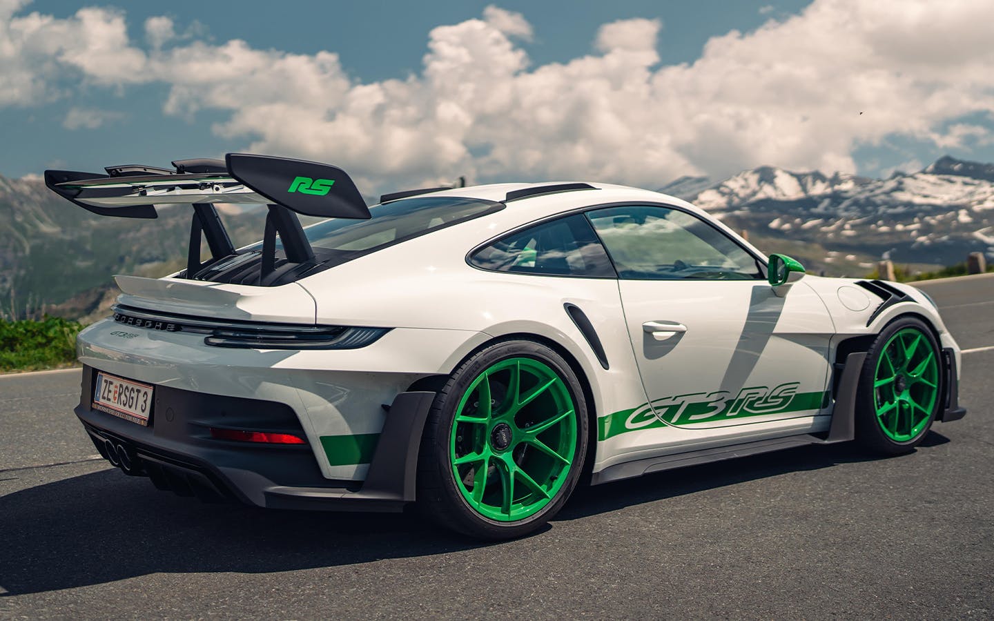 Porsche 911 GT3 RS with snowy mountains in background