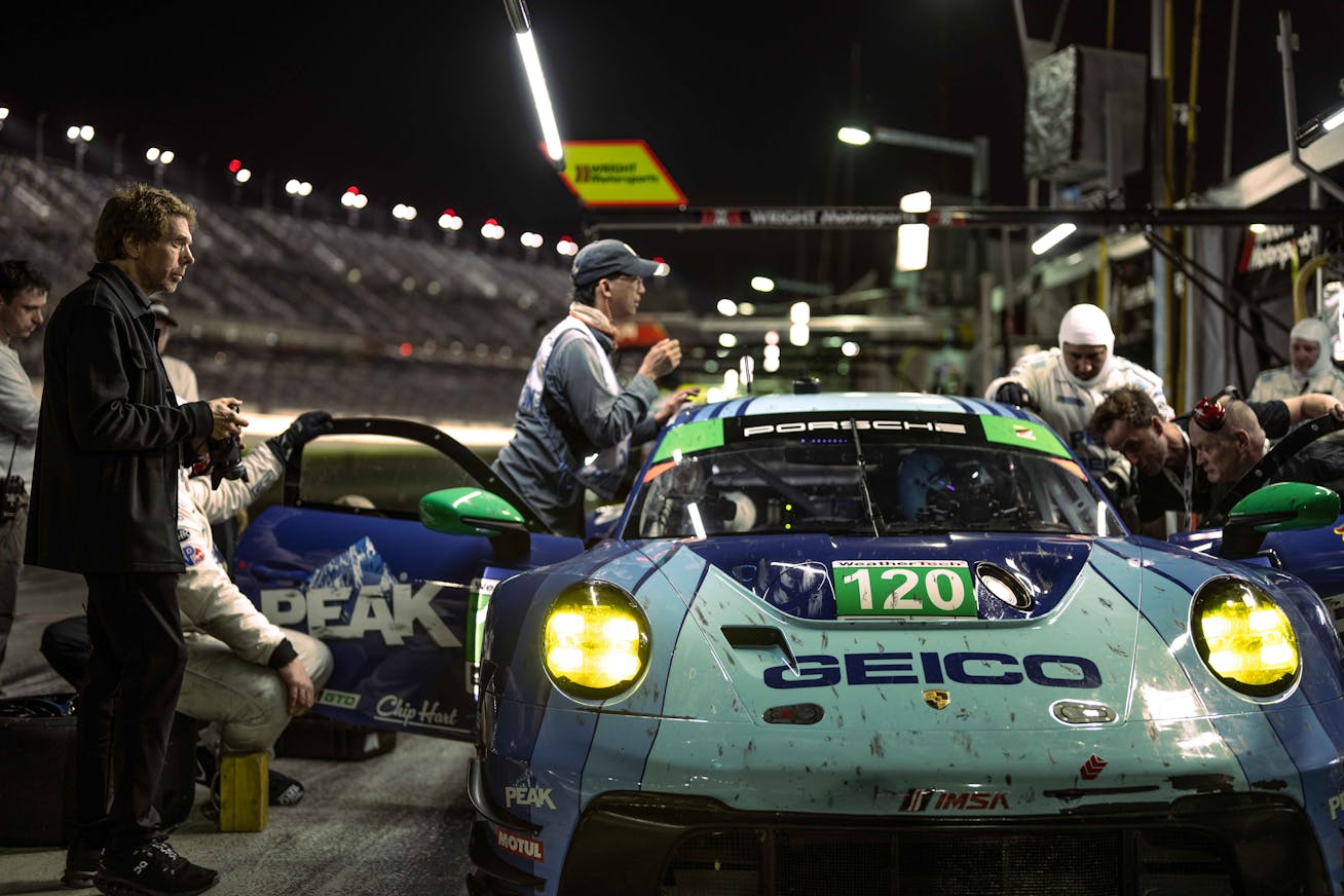 Porsche 911 racecar during pitstop for filming of F1® The Movie