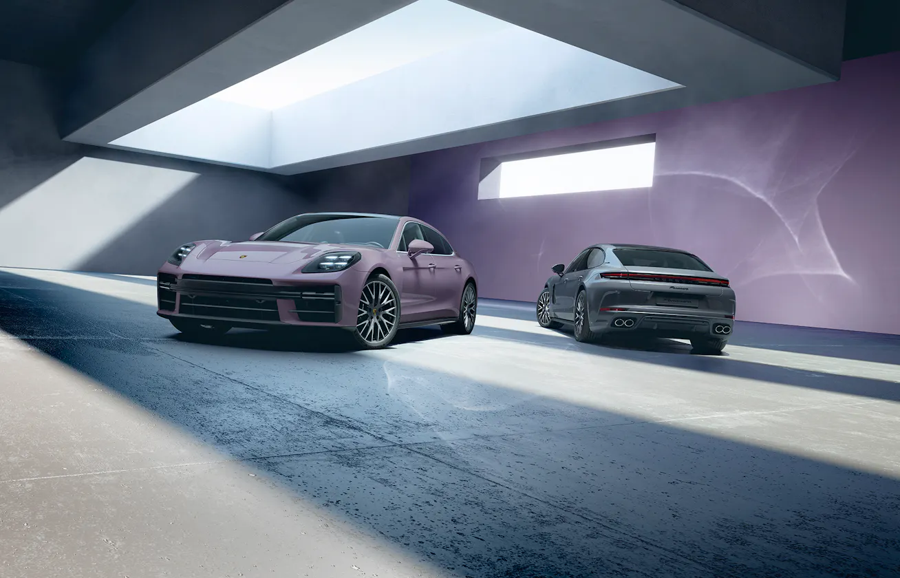 Image showing Porsche Panamera range with modern structure in background