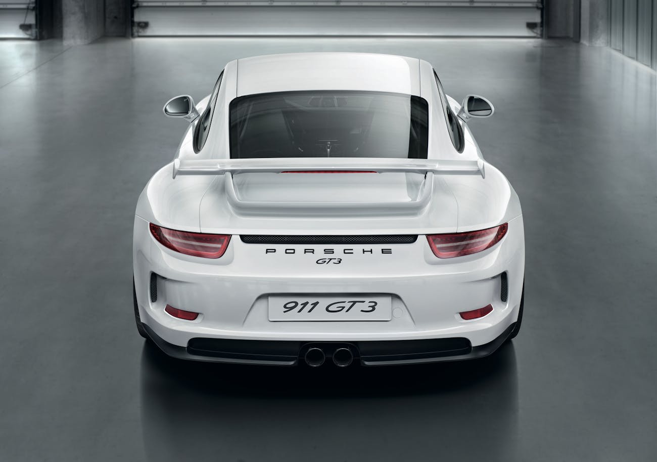 White Porsche 911 GT3 (type 991) parked in a garage