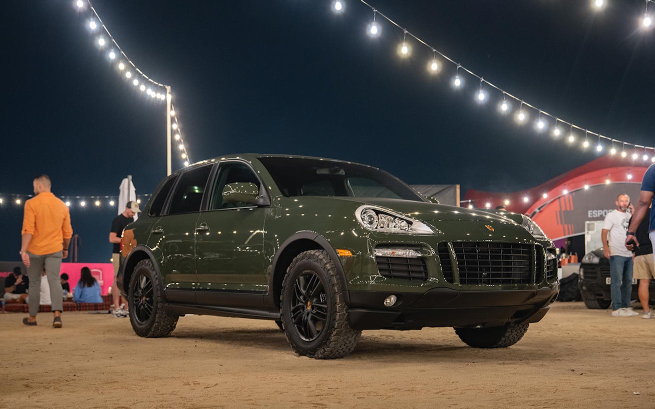Green 2009 Porsche Cayenne GTS at the 2025 Icons of Porsche in Dubai 