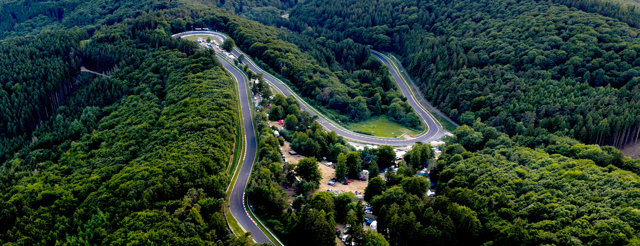 Aerial view of the Nürburgring:Nordschleife circuit showing the Karussell hairpin_hero desktop