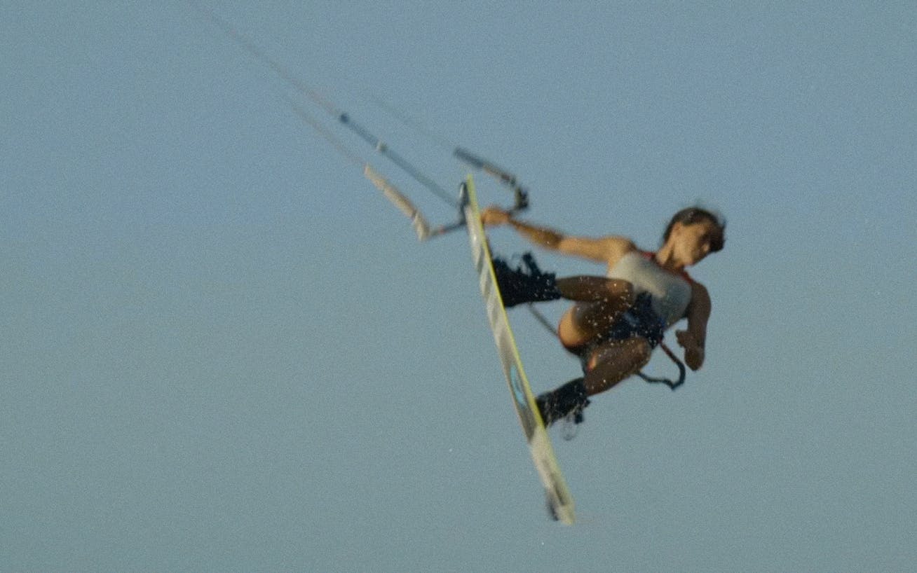 Pro freestyle kitesurfer Rita Arnaus soars high into the sky