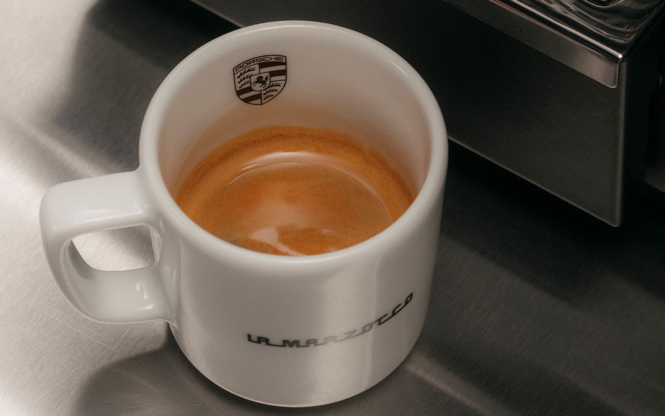 Porsche x La Marzocco espresso cup filled with coffee