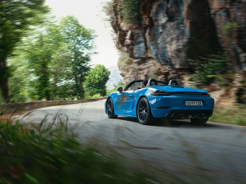 Porsche Boxster 4.0 GTS rear view driving thumbnail
