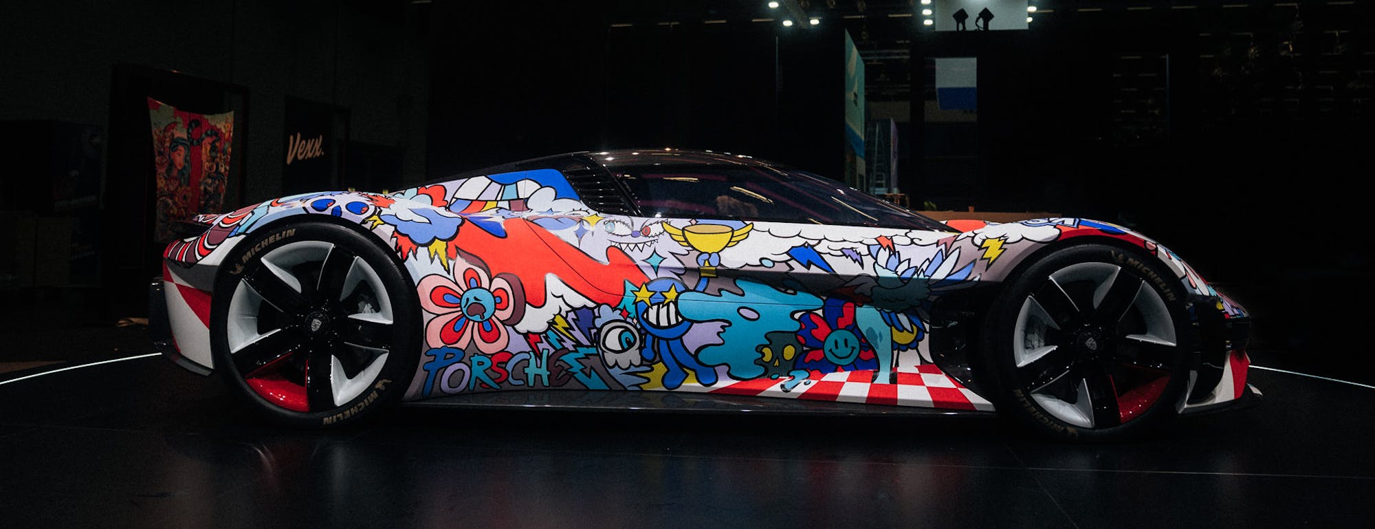 Side view of colourful hand-painted Porsche sportscar