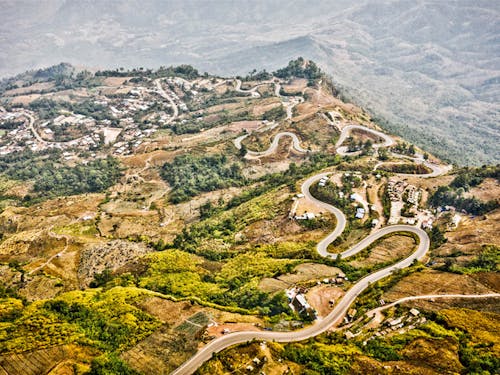 Winding roads in the remote green mountains of Nan, Thailand
