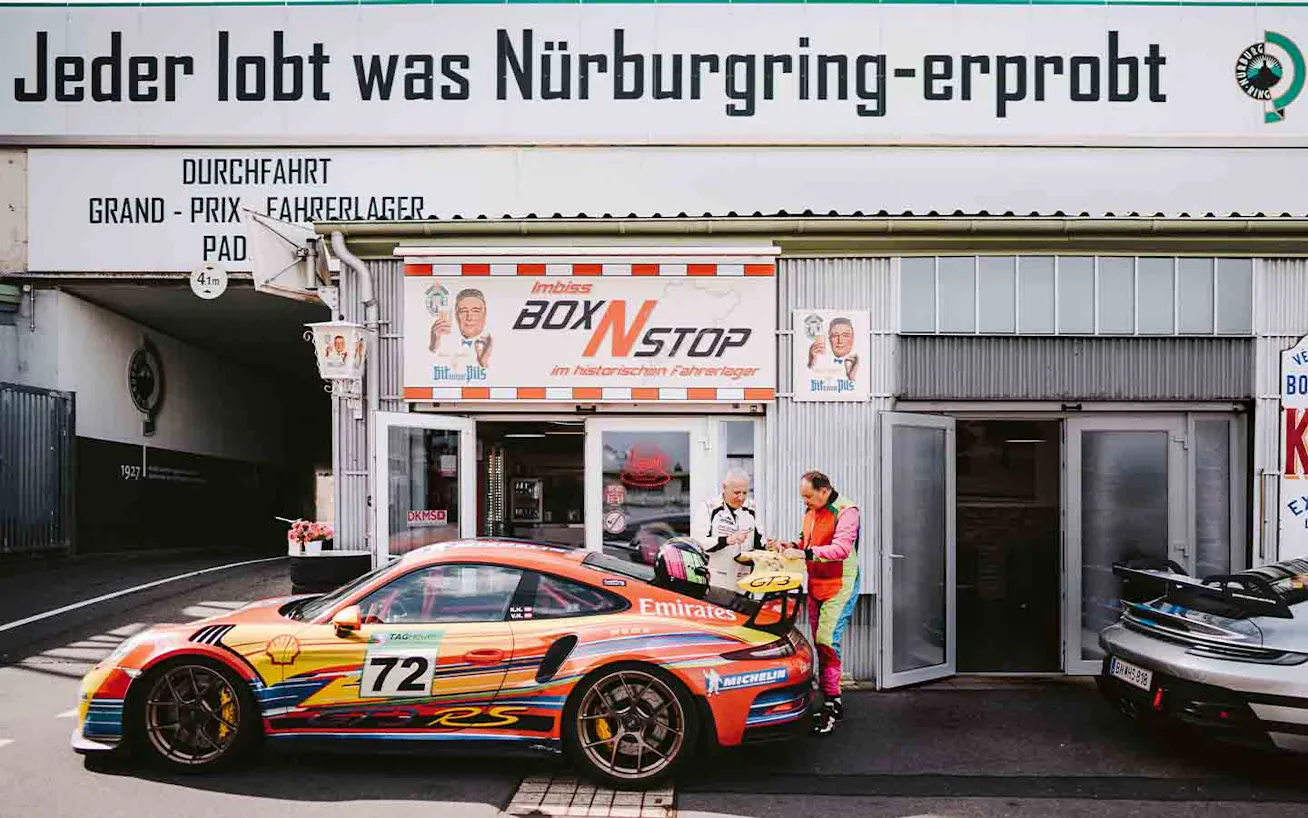 Two men with Porsche 911 GT3 RS (type 991) at the Porsche Track Experience Nürburgring