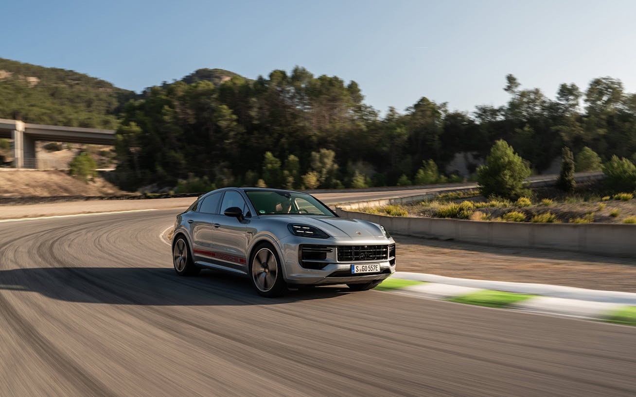 Cayenne Turbo E-Hybrid Coupé in Dolomite Silver Metallic on racetrack