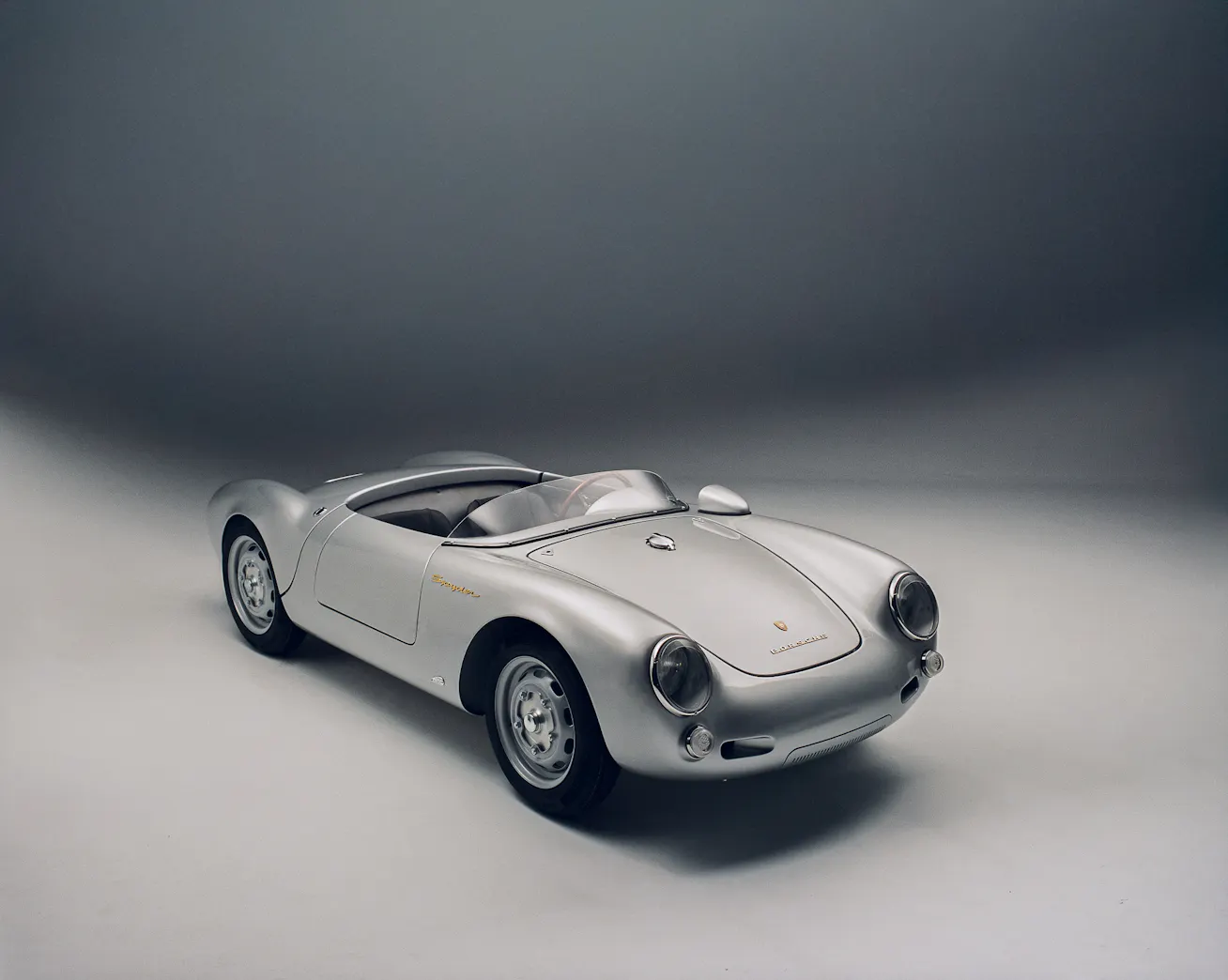 Front, side view of Hedley Studios’ Porsche 550 J with a studio background