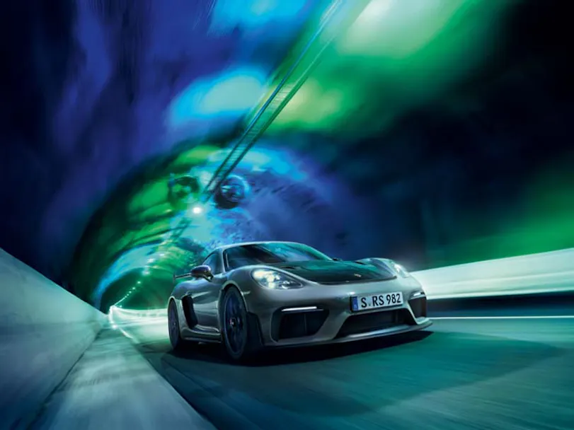 Porsche Cayman GT4 RS driving through tunnel thumbnail