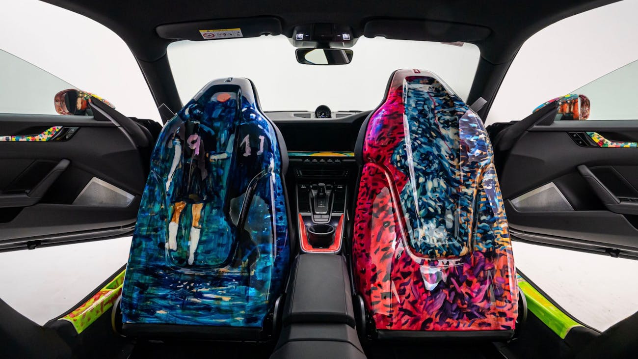 Brightly coloured hand-painted seat backs inside Porsche 911 Carrera