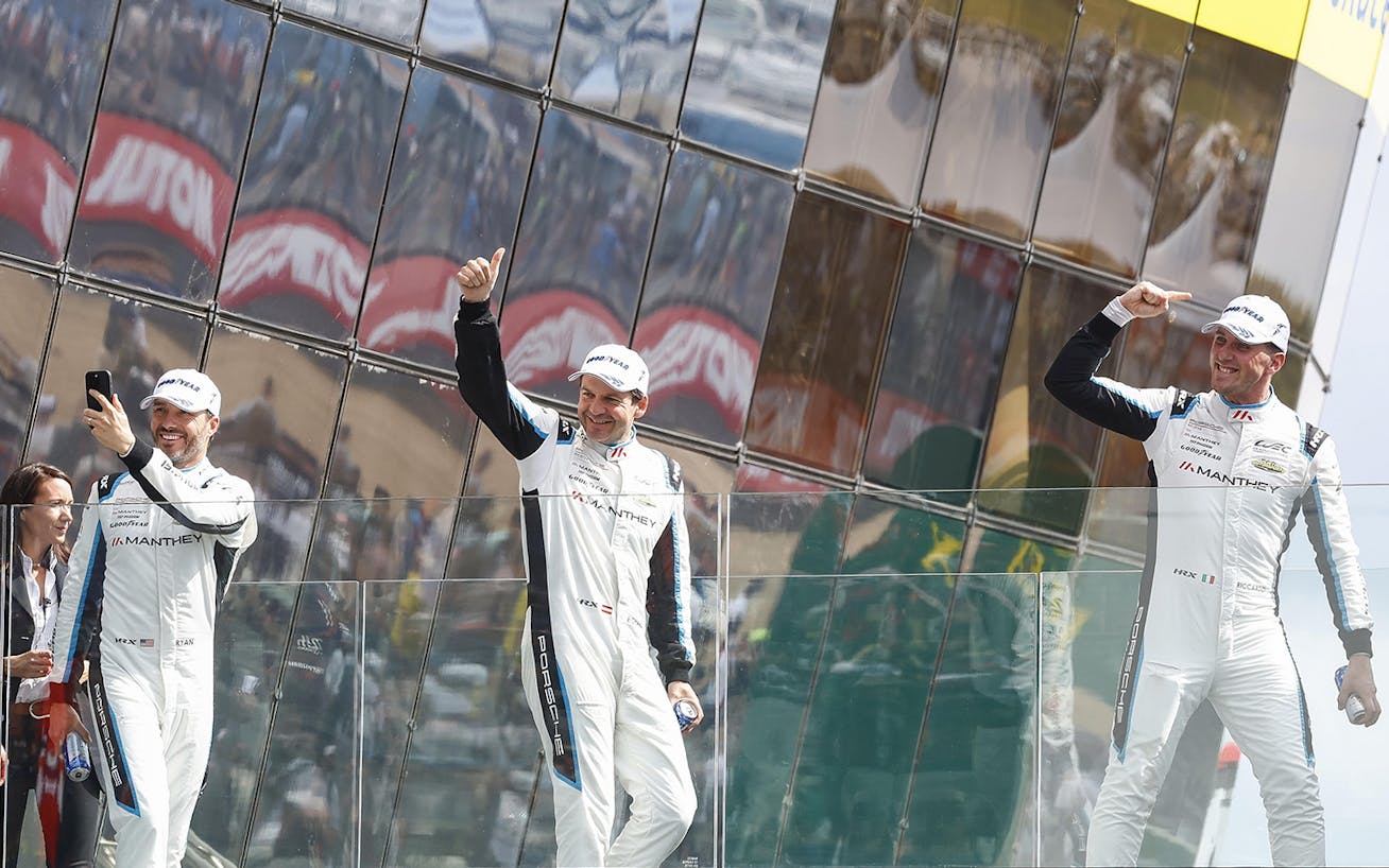 Ryan Hardwick, Richard Lietz and Riccardo Pera of the Manthey 1st Phorm team, celebrate a win in the LMGT3 class at the 2025 24 Hours of Le Mans