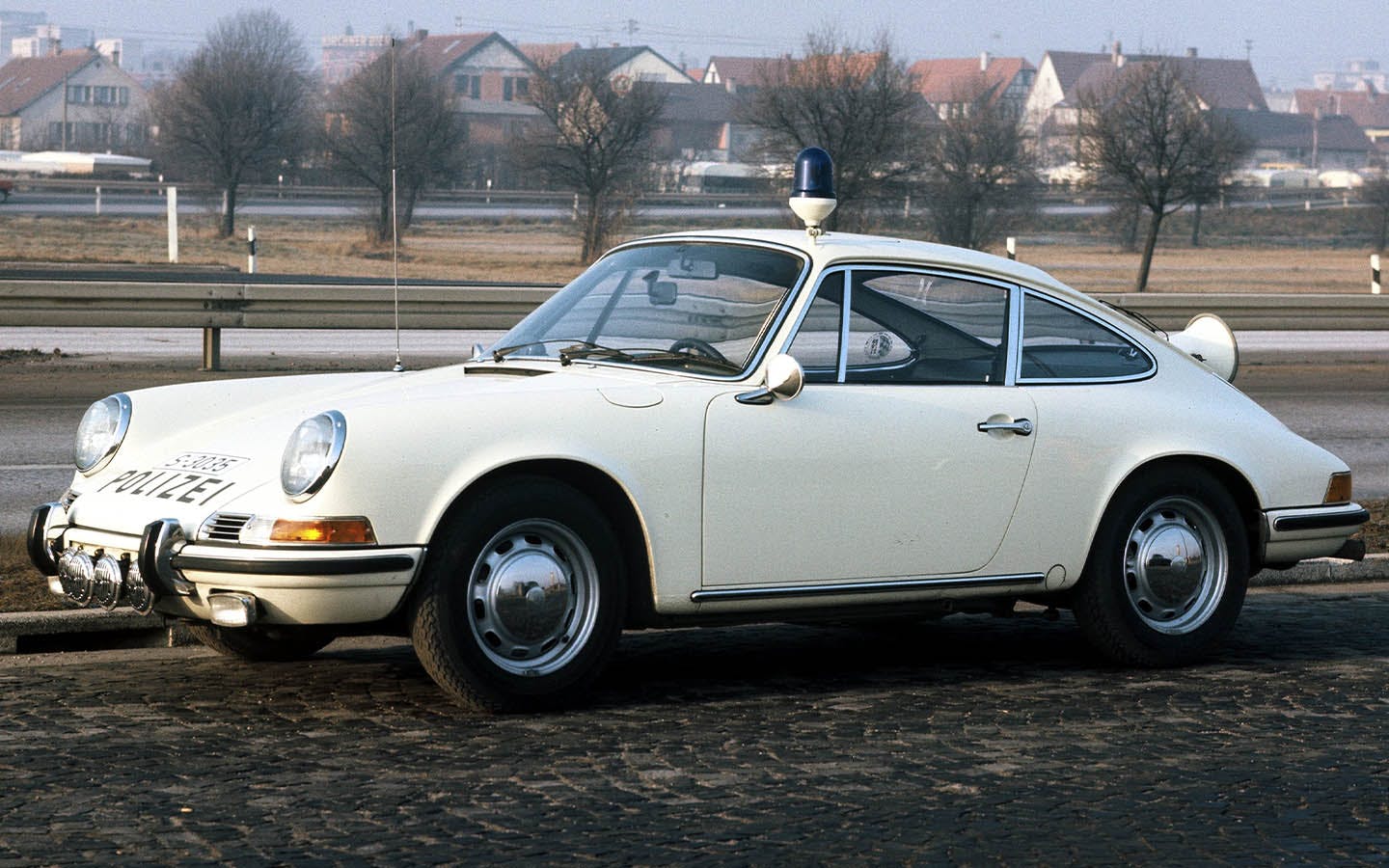 Side view of classic Porsche 911 police car