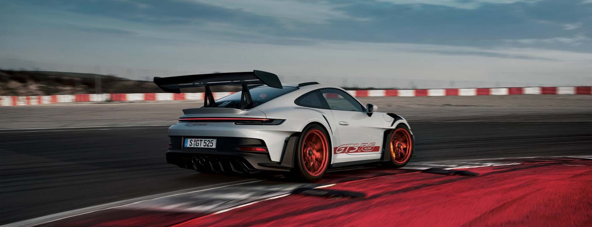 Porsche 911 GT3 RS driving on racetrack