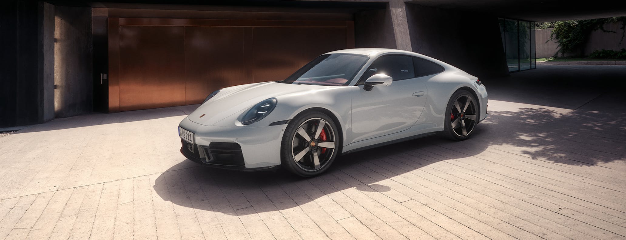 Porsche 911 Carrera S parked in the sun