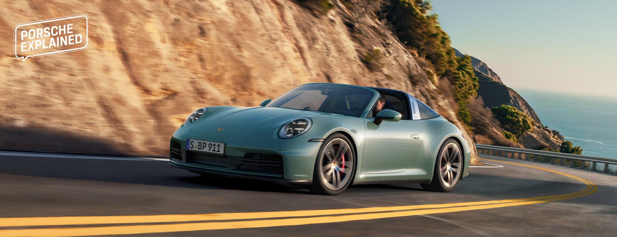Porsche 911 Targa 4S driving on coastal road