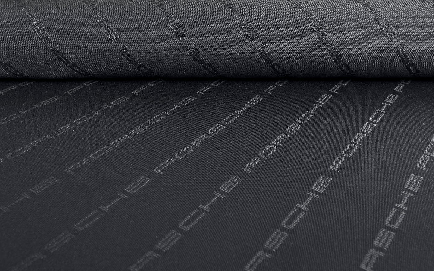 Historical Fabrics by Porsche_Porsche Script Fabric Black_gallery 2.4